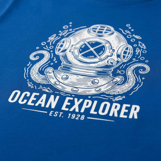 Blue ocean explorer t-shirt with white diving helmet design and octopus accents.